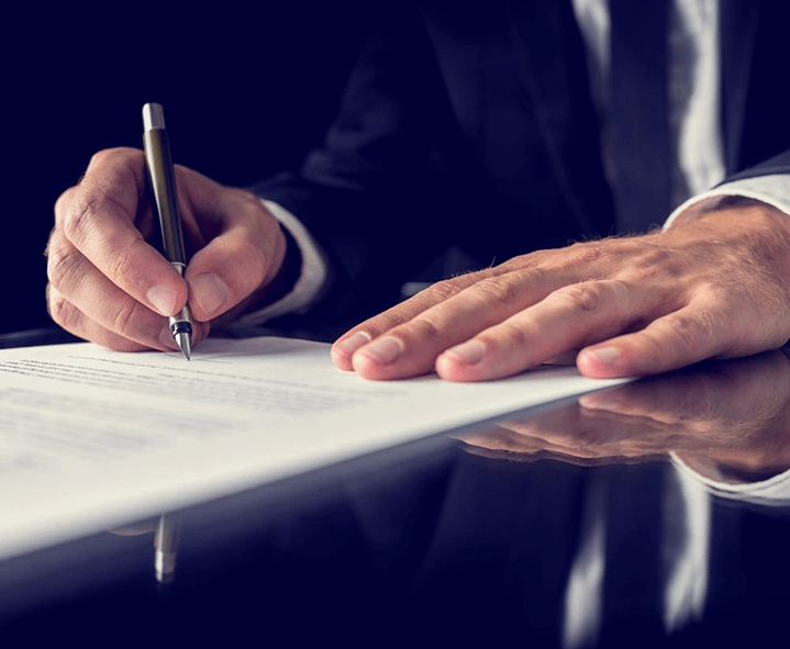 Attorney signing legal document